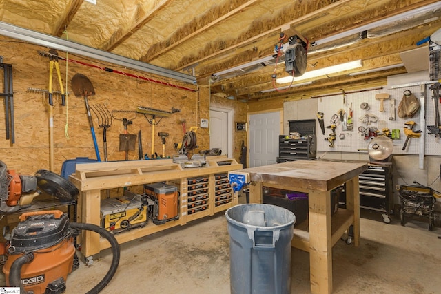 interior space featuring a workshop area