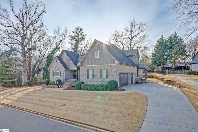 view of front facade with a garage and a front lawn