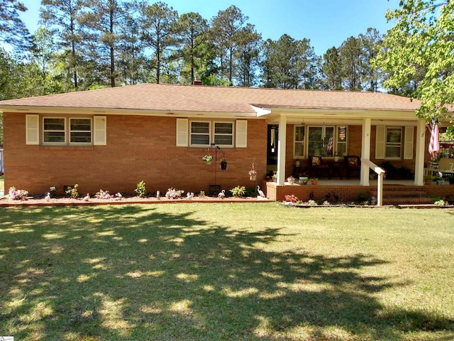 ranch-style house with a front yard