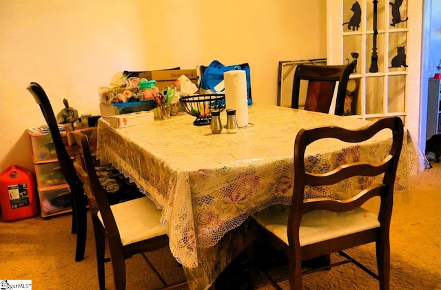 dining area featuring carpet flooring