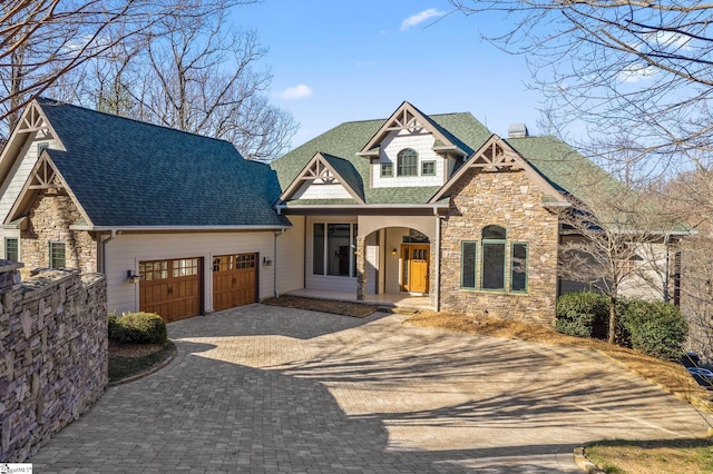 craftsman-style home with a garage and covered porch