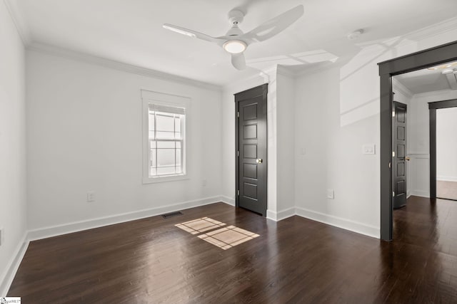 unfurnished bedroom with ceiling fan, ornamental molding, and dark hardwood / wood-style flooring