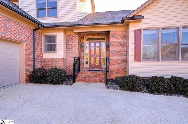 property entrance with a garage