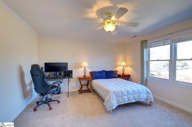 bedroom featuring carpet floors, ornamental molding, and ceiling fan