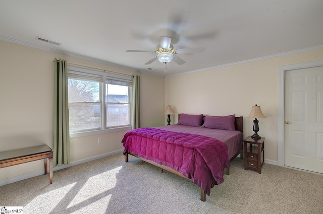 bedroom with crown molding, light colored carpet, and ceiling fan