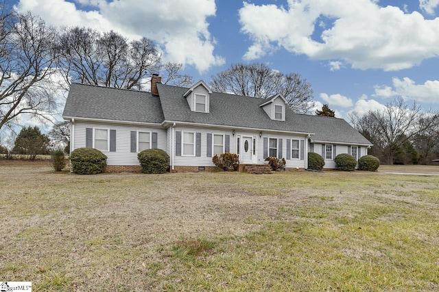 cape cod home with a front yard