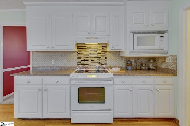 kitchen featuring ornamental molding, white cabinets, white appliances, and decorative backsplash