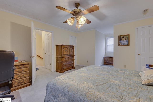 bedroom featuring light carpet, ornamental molding, and ceiling fan