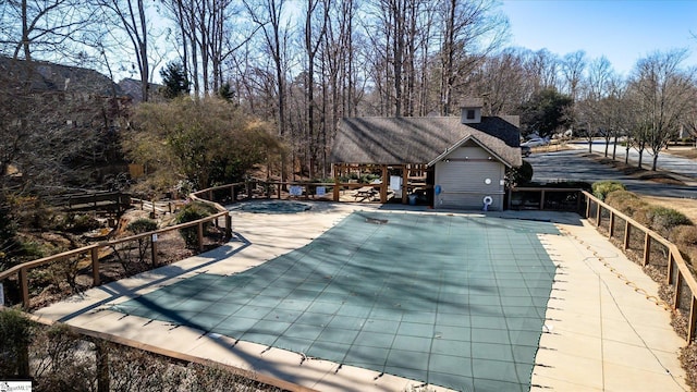 view of pool featuring a patio area