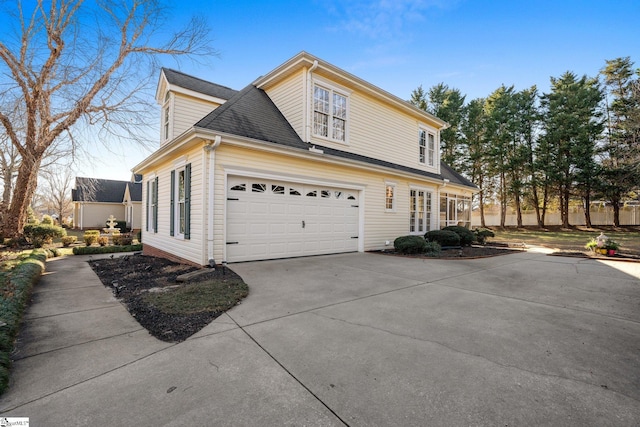 view of home's exterior with a garage