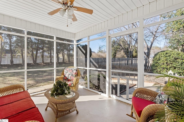 sunroom featuring a wealth of natural light and ceiling fan