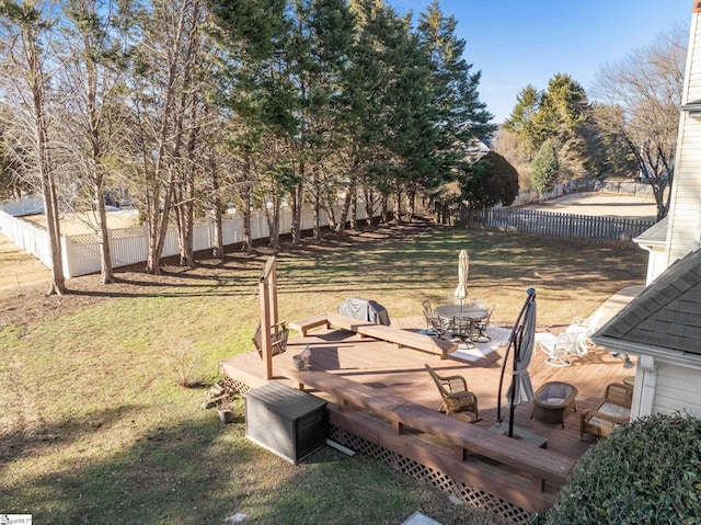 view of yard with a wooden deck