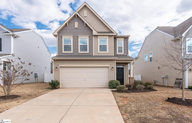 view of front of property with a garage