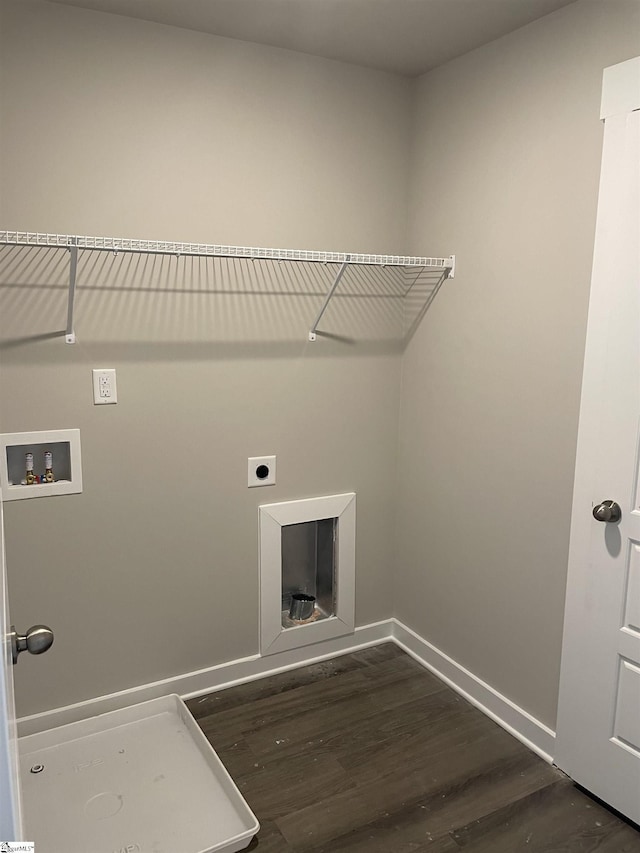 laundry room with electric dryer hookup, washer hookup, and dark hardwood / wood-style flooring