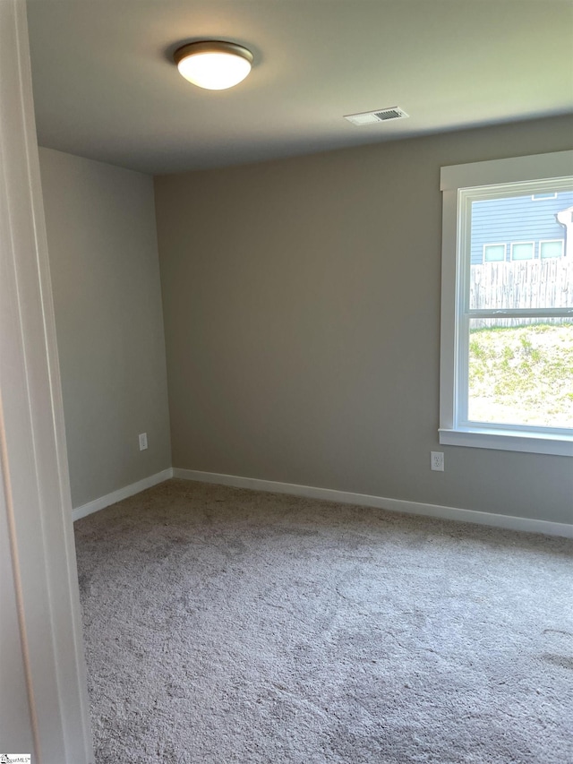 empty room featuring carpet floors