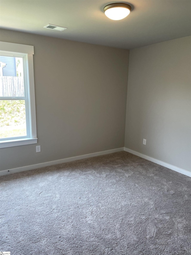 empty room with carpet floors