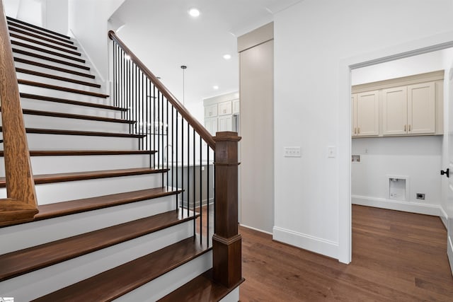 stairs with wood-type flooring