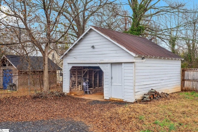 view of outbuilding with a garage