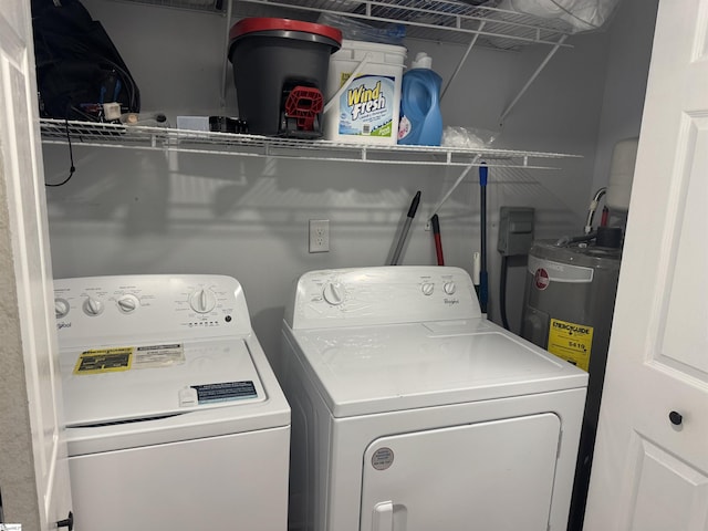 laundry room with independent washer and dryer