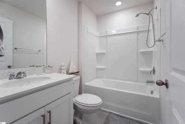 full bathroom featuring vanity, toilet, and washtub / shower combination