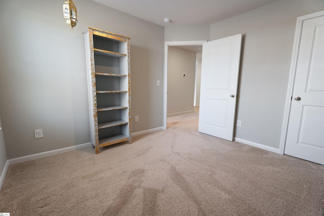 unfurnished bedroom featuring carpet flooring