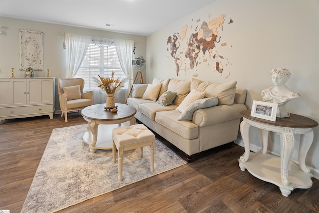 living room with dark hardwood / wood-style flooring