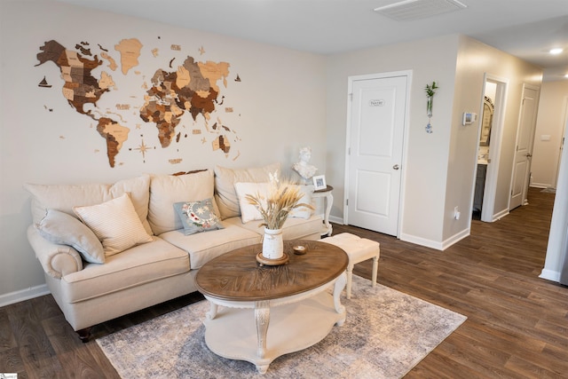 living room with dark hardwood / wood-style flooring