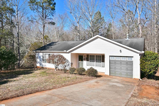 ranch-style home featuring a garage