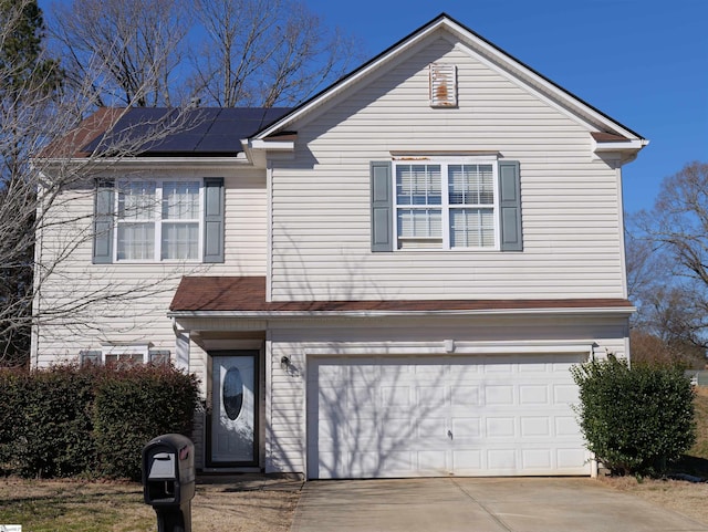 107 Montauk Dr, Greenville, SC 29607 - view of front facade featuring a garage and solar panels