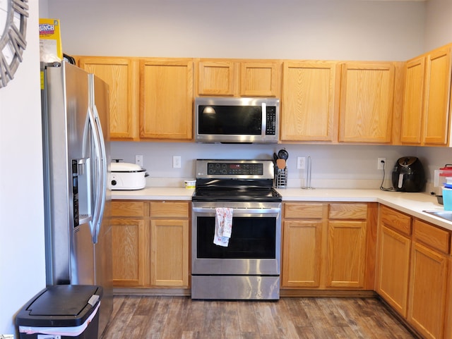 107 Montauk Dr, Greenville, SC 29607 - kitchen with appliances with stainless steel finishes, dark wood-type flooring, and light brown cabinetry