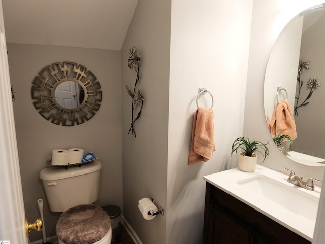 107 Montauk Dr, Greenville, SC 29607 - bathroom with vanity, lofted ceiling, and toilet