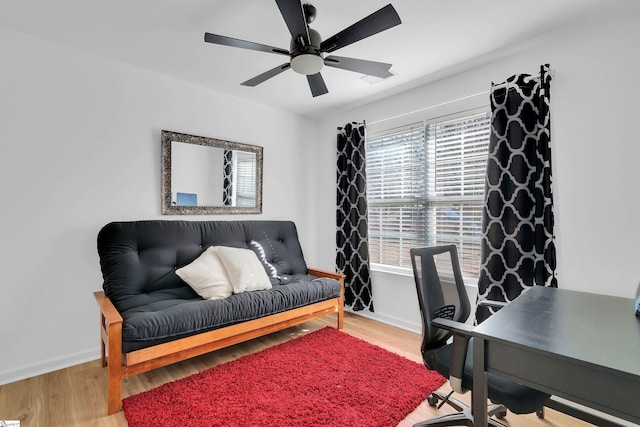 office space with hardwood / wood-style floors and ceiling fan