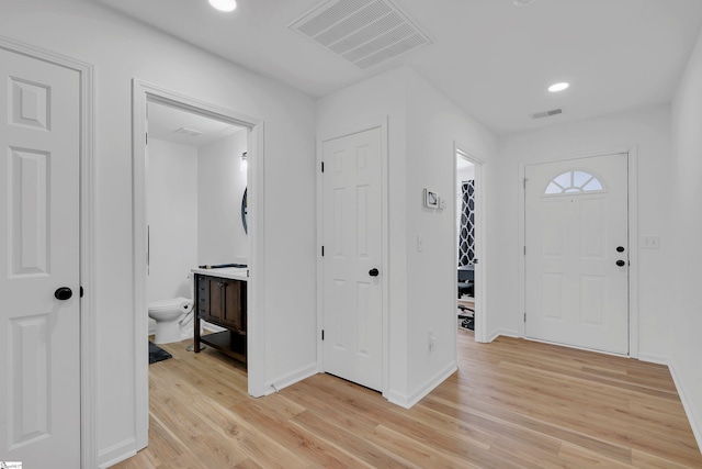 entrance foyer with light wood-type flooring