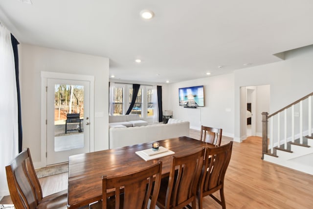 dining space featuring light hardwood / wood-style floors