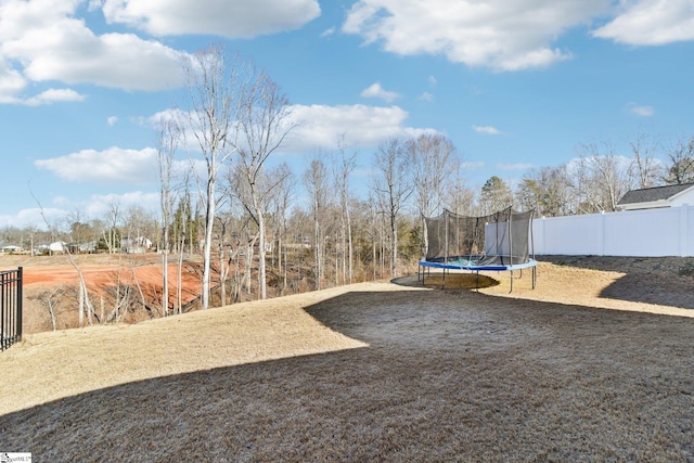 view of yard featuring a trampoline