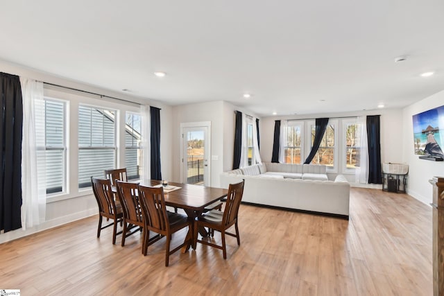 dining room featuring light hardwood / wood-style floors