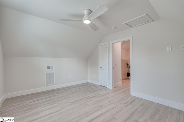 bonus room with vaulted ceiling, ceiling fan, and light hardwood / wood-style flooring