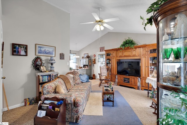 living room with ceiling fan, lofted ceiling, and carpet