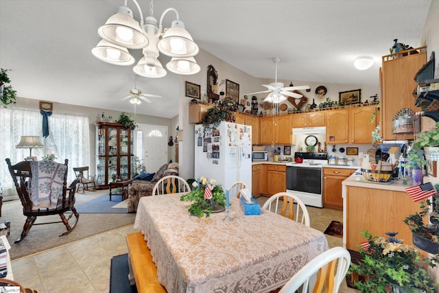 dining room featuring lofted ceiling, a textured ceiling, and ceiling fan