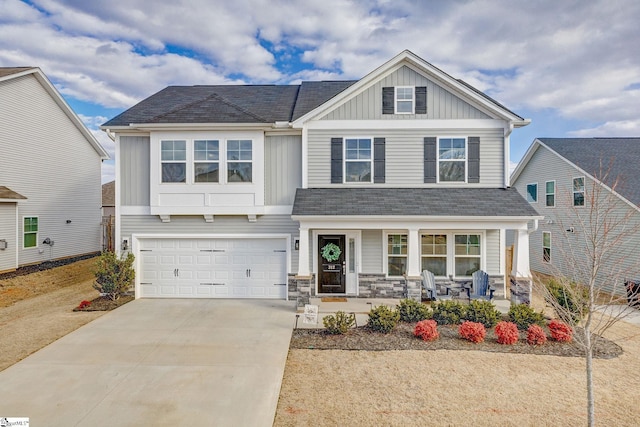 craftsman-style house featuring a garage and covered porch