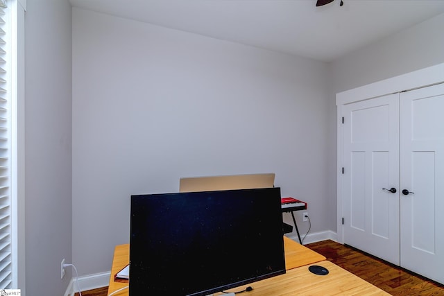 office space with dark hardwood / wood-style flooring