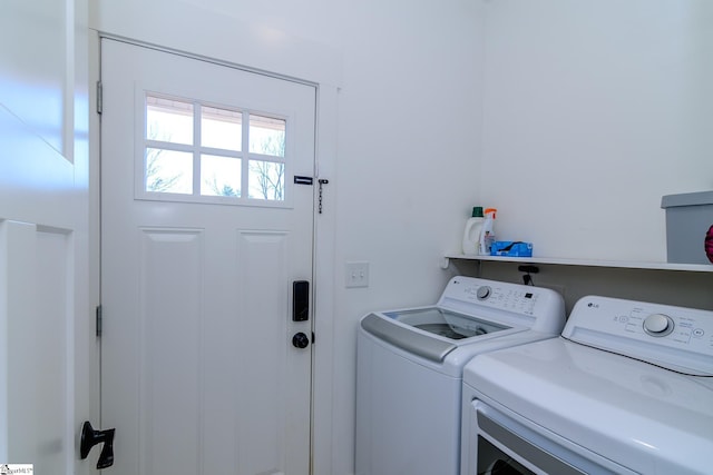 washroom with washer and clothes dryer