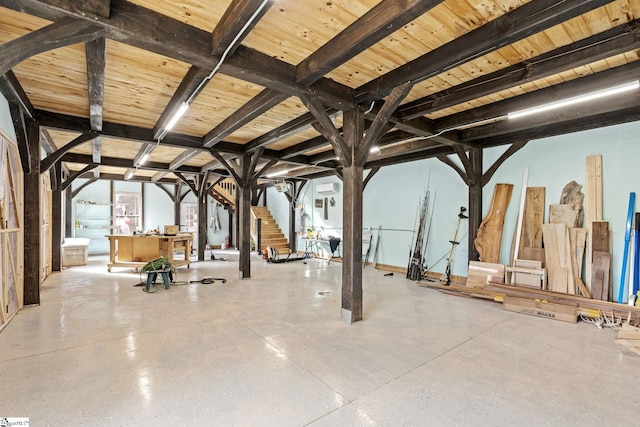 interior space featuring beamed ceiling and wooden ceiling