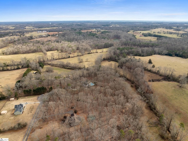 birds eye view of property featuring a rural view