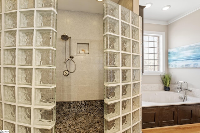 bathroom featuring ornamental molding and plus walk in shower