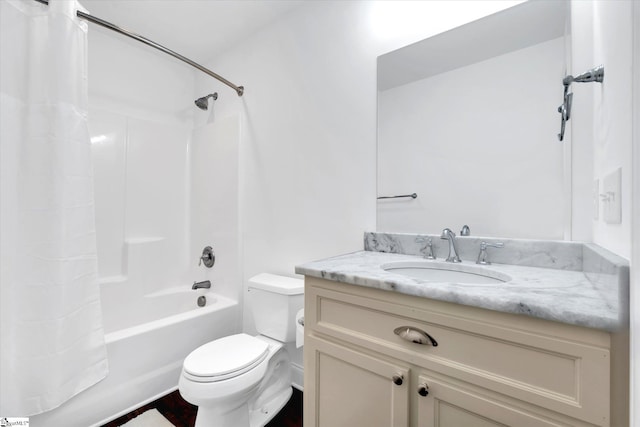 full bathroom with shower / bath combination with curtain, vanity, and toilet