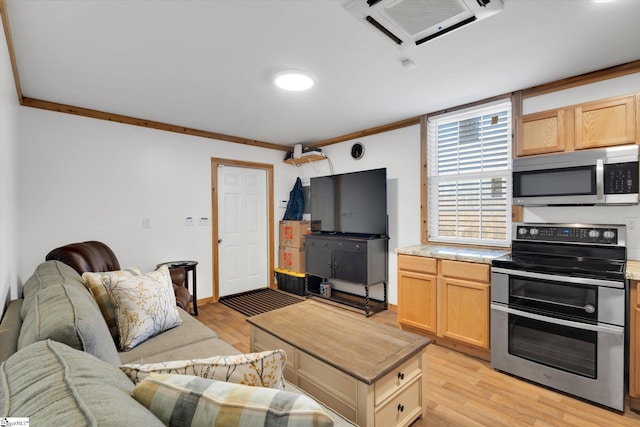 interior space featuring crown molding, stainless steel appliances, light brown cabinetry, and light hardwood / wood-style floors