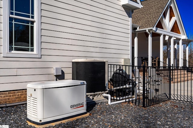 view of side of property featuring central AC unit