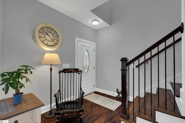 foyer entrance featuring dark hardwood / wood-style floors