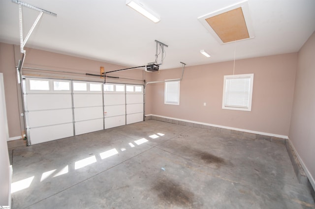 garage featuring a garage door opener